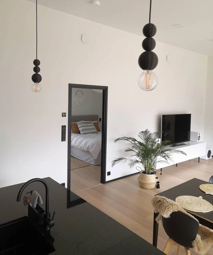 Tikkurila Paper F497 living room with door to the bedroom
