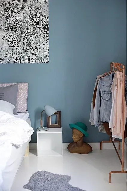 Interior with blue walls and white floor